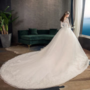 Neues Vintage-Hochzeitskleid mit O-Ausschnitt und vollen Ärmeln