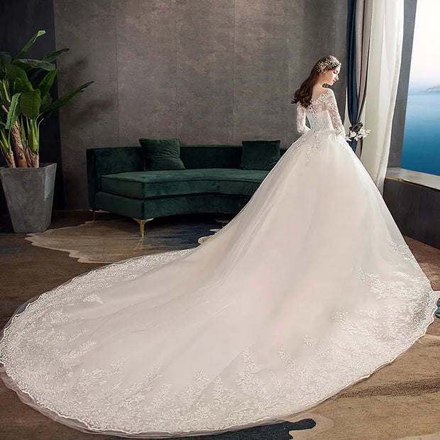Neues Vintage-Hochzeitskleid mit O-Ausschnitt und vollen Ärmeln