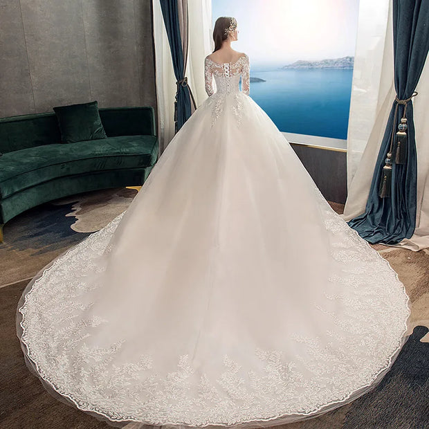 Neues Vintage-Hochzeitskleid mit O-Ausschnitt und vollen Ärmeln